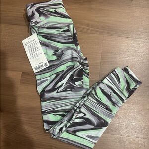 lululemon athletica Swirl Pattern Leggings in Black and Green